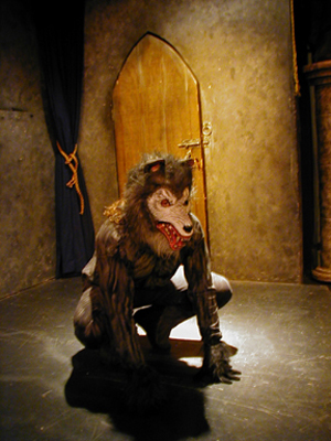 The Wolf, crouching.